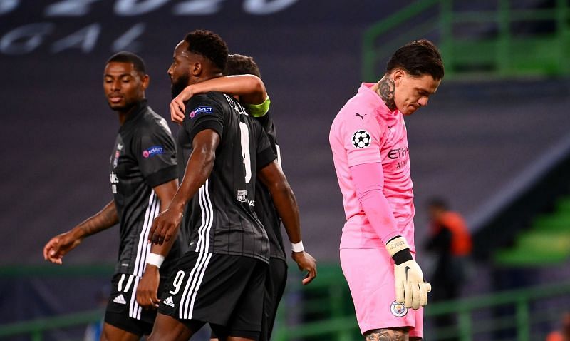 Dembele celebrates with his teammates after scoring Lyon's 3rd goal of the night